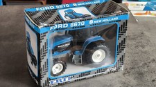 1/32 ERTL 313 NEW HOLLAND FORD
