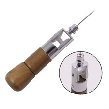 Machine à coudre à la main