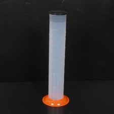 Tube doseur d'huile gradué