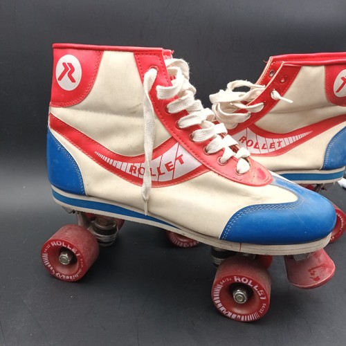 Paire patins roulettes - à,