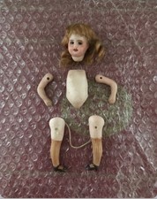 Poupée mignonnette (15 cm)