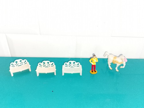 Polly pocket figurine doll