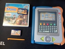 Console Storio VTech + 2 jeuw - WINNIE L'OURSON & Rufus un petit chien en ville