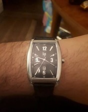 montre lip heritage cadran noir quartz tank tonneau fonctionne