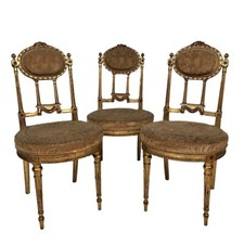 Série de trois chaises de style Louis XVI en bois doré, vers 1900