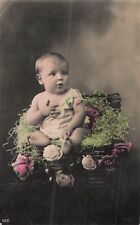 CP BABY IN SUITCASE WICKER FILLED ROSES - 27107