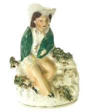 sujet faïence fine anglaise représentant jeune berger au repos  . XX siècle.