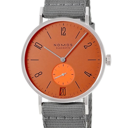 Nomos tangente date - date, pop