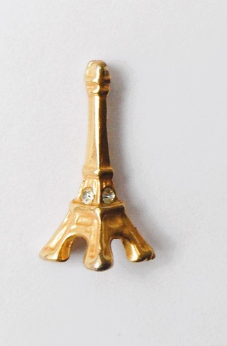 Pin doré strass tour eiffel - pin's,