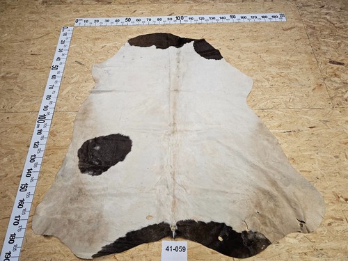 Peau vache avec - avec, petits