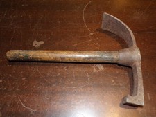 Herminette à talon de