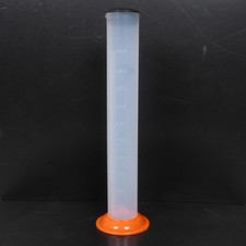 Tube doseur d'huile gradué