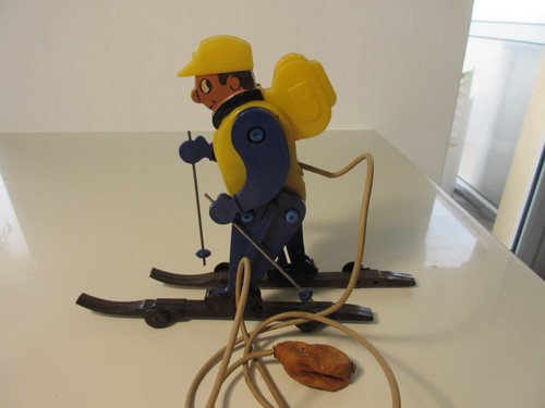 Automate skieur - le,