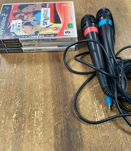 Lot jeux singstar 2 micros - singstar,