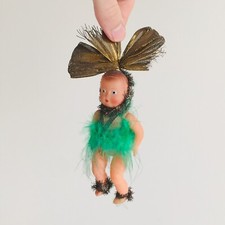 1 small celluloid bathing doll (not Petitcollin) Christmas, Easter? antique