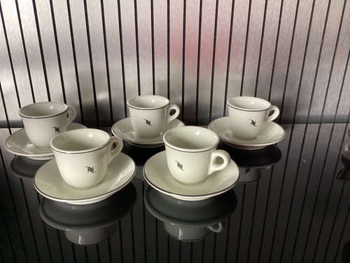 Lot anciennes tasses à - lot,
