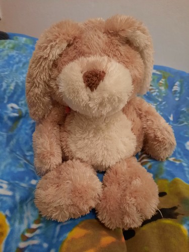 Grande peluche doudou tout