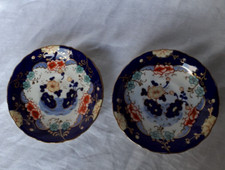 2 coupelles sous tasses en porcelaine décor imari