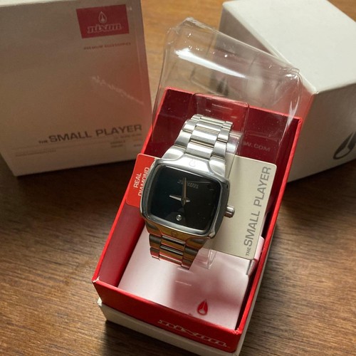 Nixon small player - small,