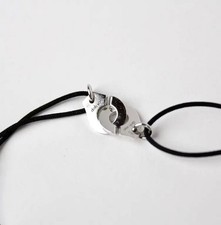Bracelet Dinh Van sur cordon