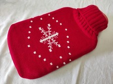 Bouillotte en caoutchouc avec housse rouge