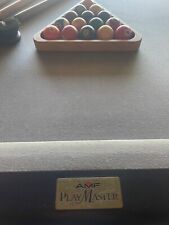 Pool Table, with extra balls and cues and cover. Includes pool light, racks .