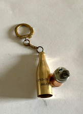 Porte clef ancien publicitaire