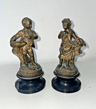Lot de 2 sculptures en bronze sur marbre.