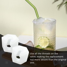 2 écrous de rechange pour