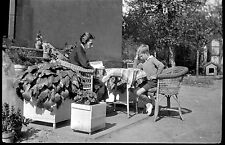 Woman and child sitting reading table - old photo negative year. 1930 1940