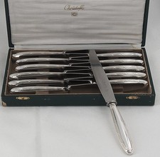 Christofle Rubans, 12 couteaux de table en métal argenté, en excellent état.