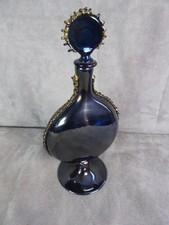 JOLI FLACON en verre teinté.