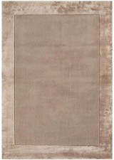 Tapis touffetés en soie et