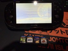 PS VITA and Four Games