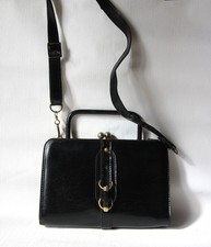 Elégant sac noir vintage en cuir véritable. style années 60/70.