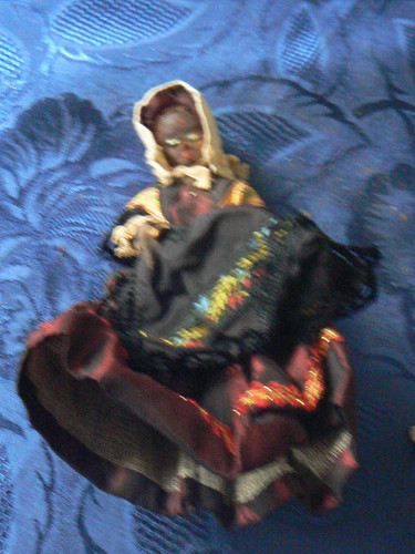 Old black doll - black, or