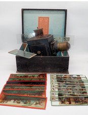 antique magic lantern in box with glass plate