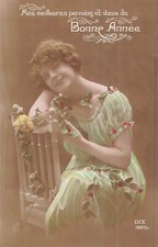 CP GOOD YEAR WOMAN ON CHAIR WITH HOLLY - 62226