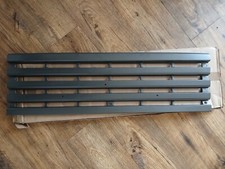Nissan Cabstar F22, Radiator grill, new genuine part, years 82-85
