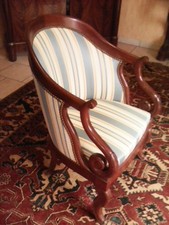 paire de fauteuils à crosse acajou