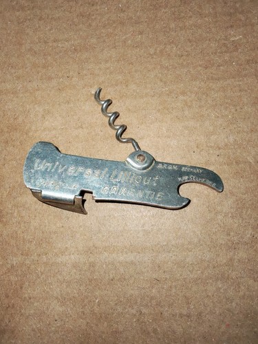 Ancien ouvre boite tire - ancien,