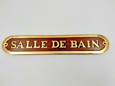 Plaque de porte bois et laiton