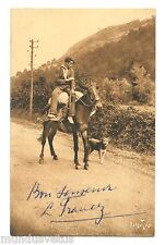 Farm valet on his horse. Dog . Farmer on his horse . Dog . Agriculture