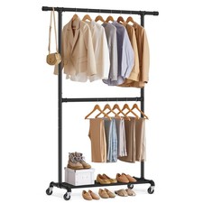 Portant vêtements - à,