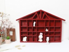 Etagère à collection forme