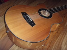 CUSTOM AND USEDE: Left Handed Freted Electro Acoustic Bass Right Mount