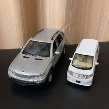 Die-cast miniature cars, lot of 2: BMW X5, Alphard