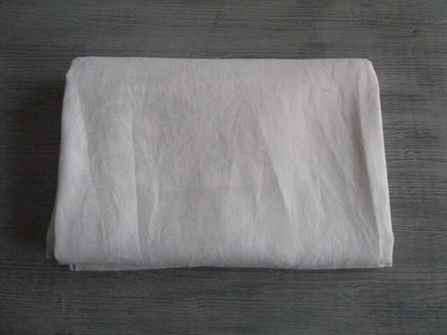 Nappe ancienne damassée