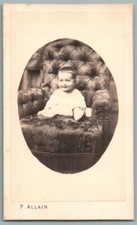CDV 1870' smiling baby sitting on armchair. Antique Allain Paris Photo. Child