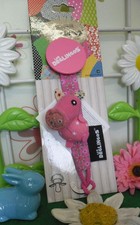 attache/accroche tétine